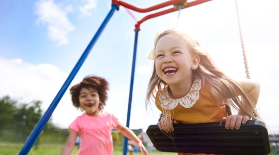 Children in playground swing