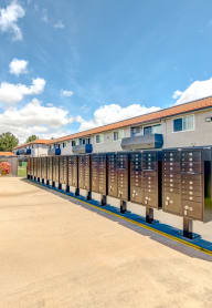 a row of metal lockers in a parking lot