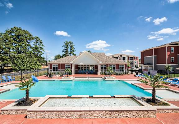 our apartments at the district feature a swimming pool at Midtown Sam Houston Apartments, Huntsville, TX, 77340