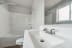 a bathroom with a toilet sink and bathtub