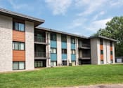 Thumbnail 4 of 46 - Apartment building with balconies at Countryside Estates Apartments, Plymouth, MN