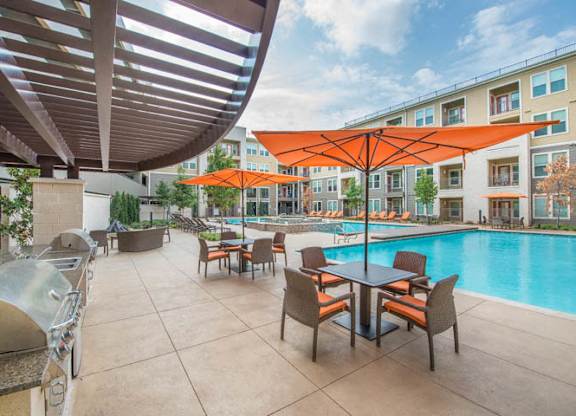 Poolside Sundeck And Grilling Area at Aviator West 7th, Texas