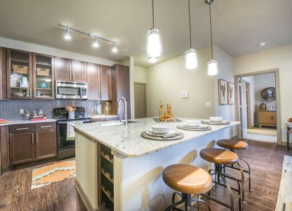 Gourmet Kitchen With Island at Aviator West 7th, Fort Worth
