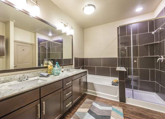 Renovated Bathrooms With Quartz Counters at Aviator West 7th, Fort Worth, 76107