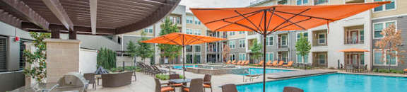 Poolside Sundeck And Grilling Area at Aviator West 7th, Texas