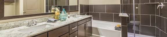 Renovated Bathrooms With Quartz Counters at Aviator West 7th, Fort Worth, 76107