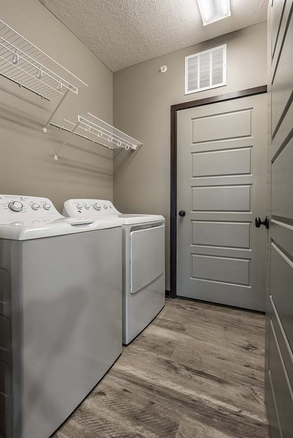 Full sized washer and dryer and laundry room in unit  at North Pointe Villas