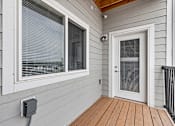 Thumbnail 32 of 32 - A wooden deck at Red Rock Apartments, Rapid City, South Dakota