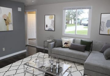 a living room with a couch and a coffee table