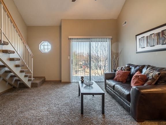 large living room with lots of natural light at Skyline View Apartments in Lincoln NE