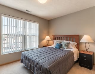 large bedroom with big window for lighting at Williamsburg Park Apartments in Lincoln NE