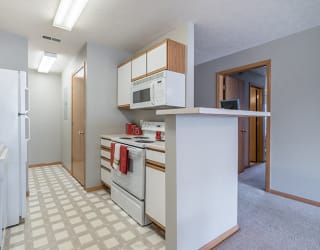 bright kitchen with lots of storage at Williamsburg Park Apartments in Lincoln NE