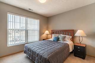 large bedroom with big window for lighting at Williamsburg Park Apartments in Lincoln NE