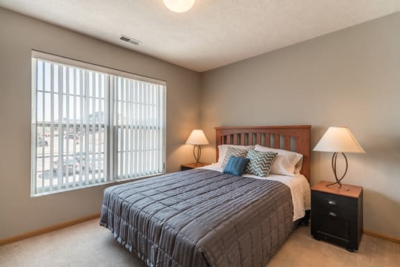 large bedroom with big window for lighting at Williamsburg Park Apartments in Lincoln NE