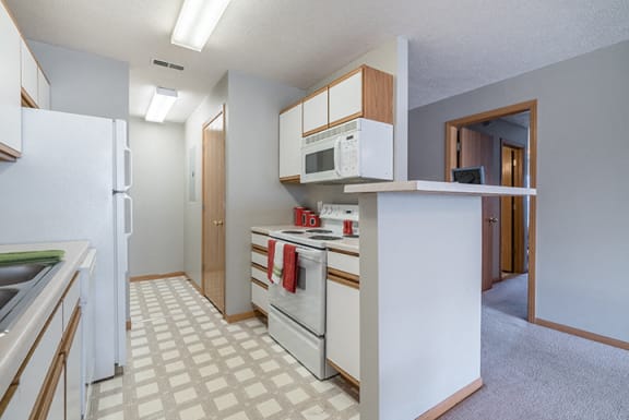 bright kitchen with lots of storage at Williamsburg Park Apartments in Lincoln NE