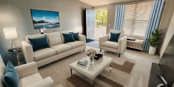 A living room with a white sofa, a white armchair, and a coffee table.