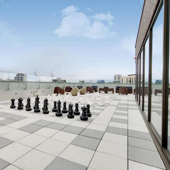 A giant chess set is set up on a rooftop at Beton Apartments, Wembley, HA9 0SL
