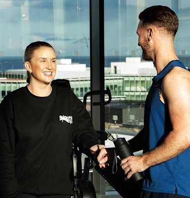 A man and a woman are working out together in a gym at Cherrywood Apartments, D18 VY3V, DUBLIN 18