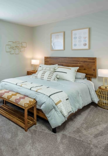 Grand Arbor Reserve Apartments in Raleigh, NC photo of a bedroom with plus hcarpeting and a large window