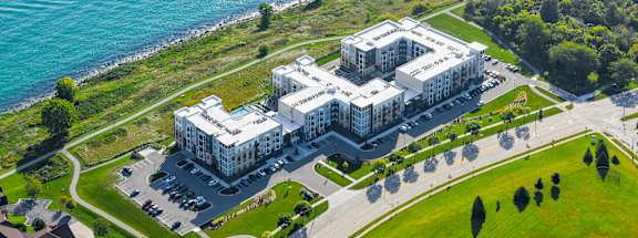 an aerial view of the property at the water s edge at 42 Hundred On The Lake, St Francis, Wisconsin, 53235