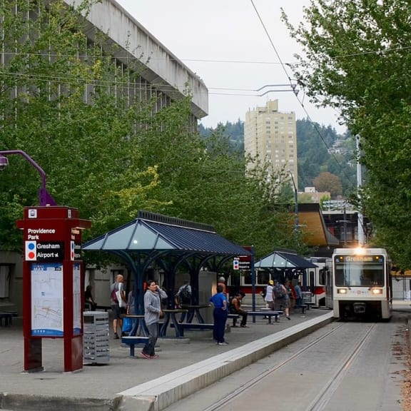 a bus is pulling up to a bus stop