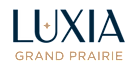 The image is a logo of a company named "LUXIA GRAND PRAIRIE".