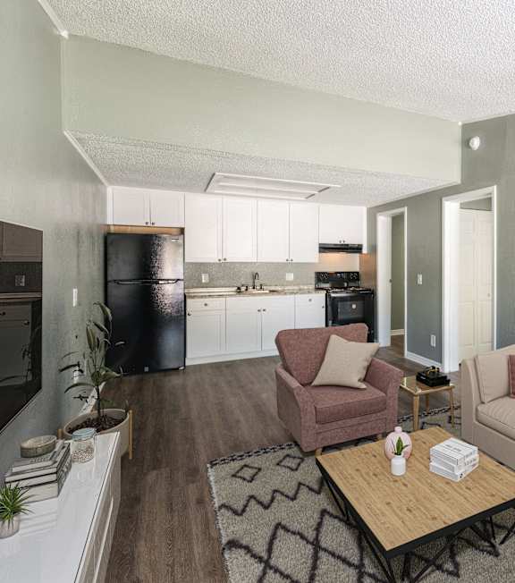 A living room with a couch, chair, and coffee table.
