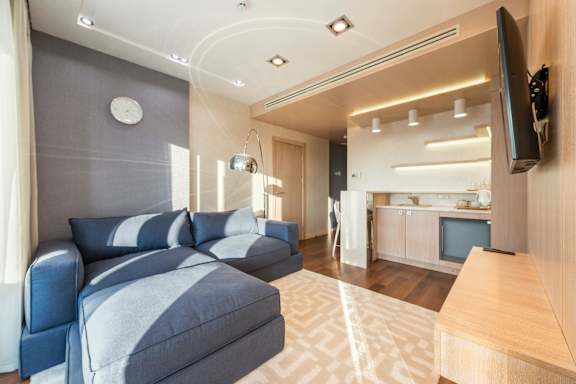 a living room and kitchen in a 555 waverly unit