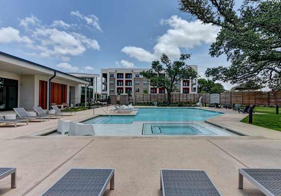 Pool area with lounge at Bridge at Saffron, Austin, TX 78717