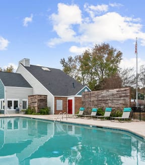Swimming pool and clubhouse at Park 2300 Apartments in Charlotte, North Carolina