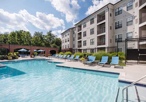 Outdoor Pool with Sundeck at The Cosmopolitan at Lorton Station in Lorton, VA