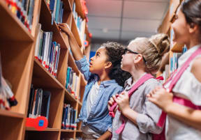 Diverse kids in library