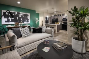 a living room with a couch and a table