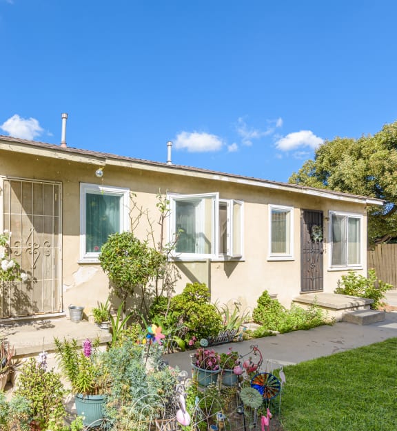 a house with a garden in front of it