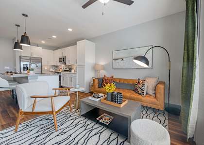 a living room with a couch and a table