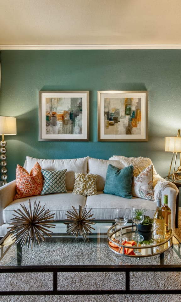 a living room with a couch and a coffee table