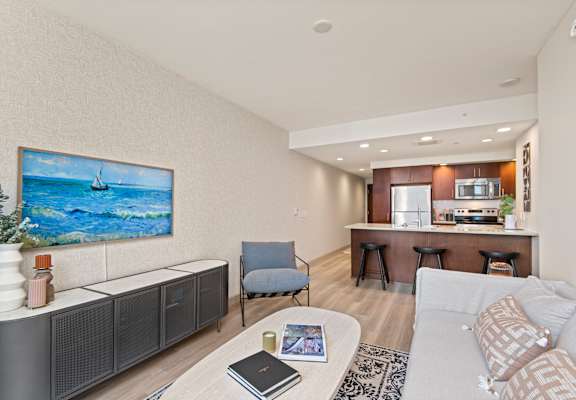 a living room with a couch and a chair