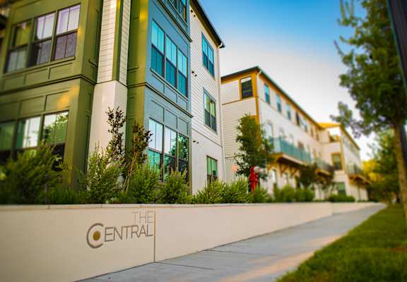 A modern building with the sign "The Central" on the wall.