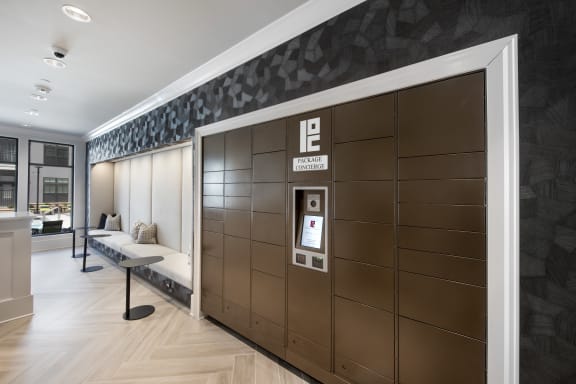 a patient room with a wall of brown lockers and a bench