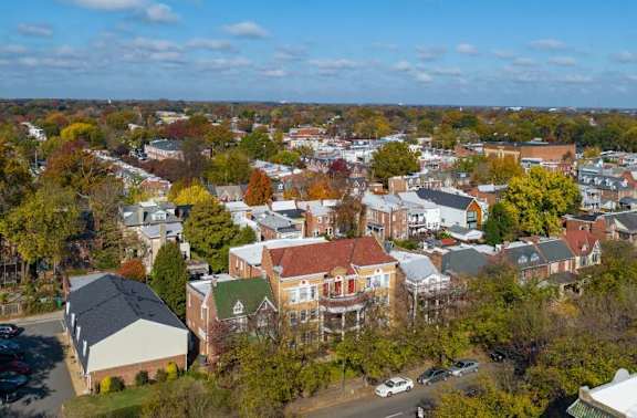 A small town with a mix of residential and commercial buildings.