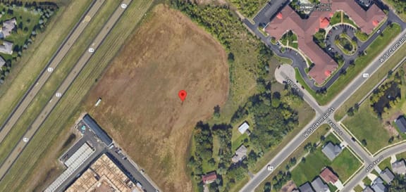 a map of a field with a red marker on it