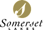 A logo with the text "Somerset Lakes" in black and gold colors.