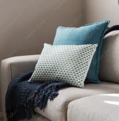 a sofa with blue and grey cushions at Oak Reserve at Winter Park, Florida, 32792