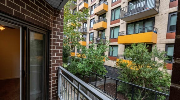 the view from the balcony of an apartment building