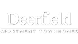 A black and white image of a sign for Deerfield Apartment Townhomes.