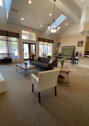 a living room with a couch and a table
