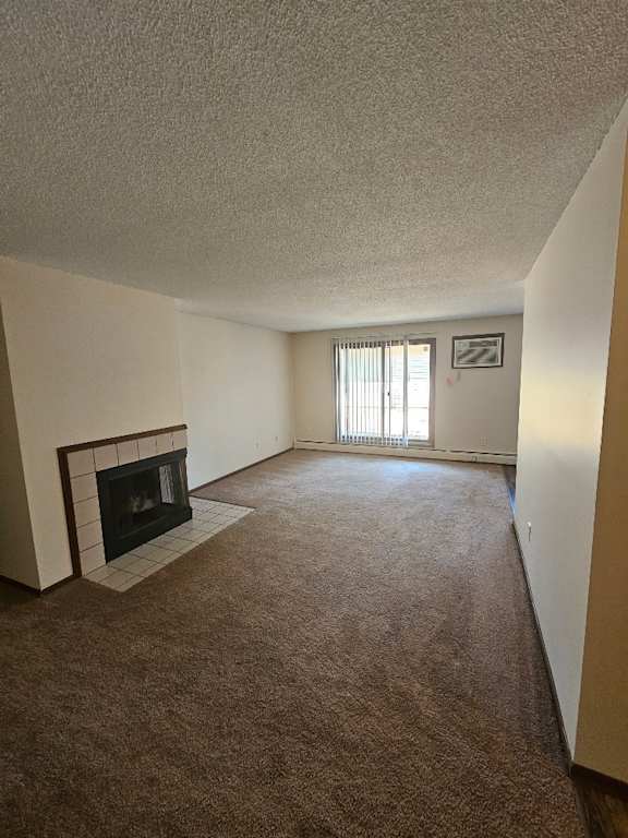 A living room with a fireplace and a window.