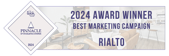 A blue and white award sign for the Pinnacle of Excellence Awards for the year 2024.