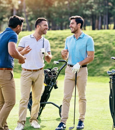 three men standing on a golf course talking to each other at Connect on Missouri, Phoenix, 85015