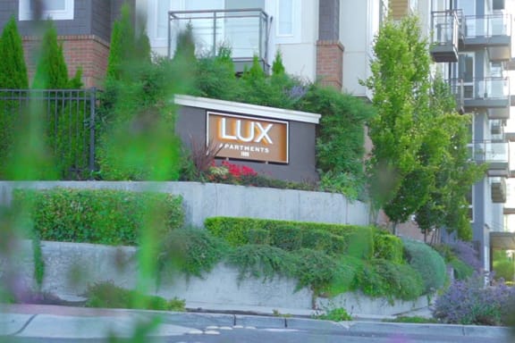 a building with a sign on the side of a street